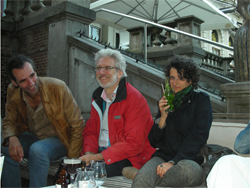 Henk, Kees and Costanza bundled up and drinking on the patio of Vertigo